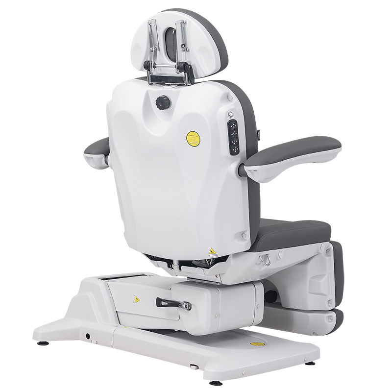 Fotel kosmetyczny SIMON w pozycji siedzącej i obrotowej